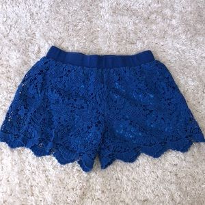 Blue lace shorts.